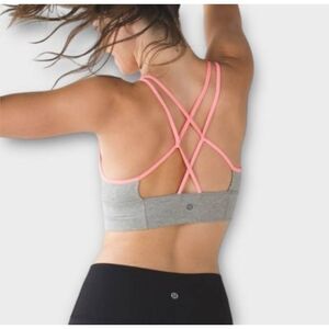 Lululemon superb grapefruit pink and grey sports bra measures like a size xs